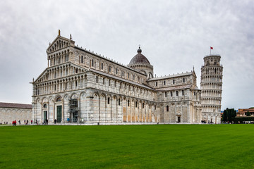 The beautiful Pisa Cathedral, a notable example of Romanesque architecture with the famous  Leaning Tower of Pisa, Tuscany, Italy.