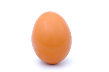 Close-up view of raw chicken eggs on background