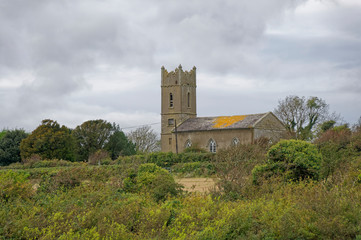 Fototapeta na wymiar St Mary's church situated on Johns Hill above the estuary at Kieran's Quay in County Wexford on an overcast day in October.