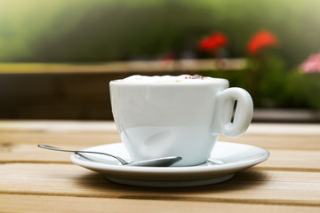 white cappuccino Cup on the table
