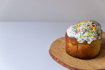 Glazed easter cake  on white marble background. Traditional food 