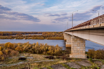 Fototapeta na wymiar Bridge over the Vetluga river. Autumn 2019.