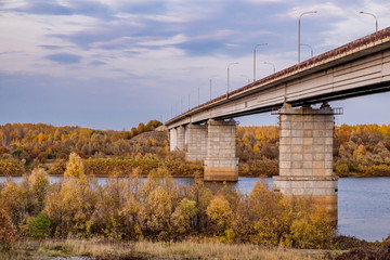 Fototapeta na wymiar Bridge over the Vetluga river. Autumn 2019.
