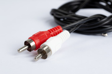 An audio cable against a white background