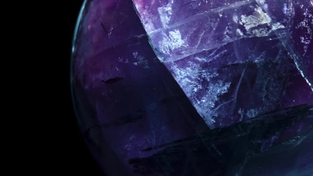 Macro mineral stone Fluorite crystal on a black background close-up