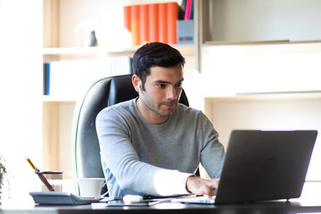 Work from home and social distancing concept. Middle aged businessman working telemarketing online at home