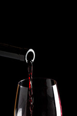Red wine on a black background ,saved clipping path.