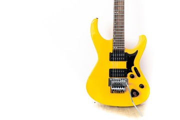 Electric guitar yellow color isolated on white