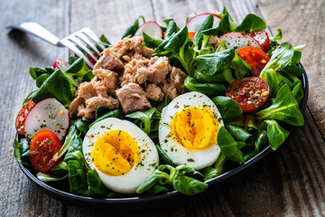 Tuna salad on wooden table
