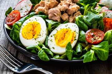 Tuna salad on wooden table