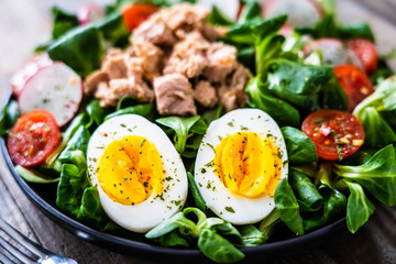 Tuna salad on wooden table