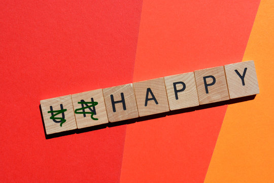 Unhappy,  with  prefix un crossed out, leaving the word Happy