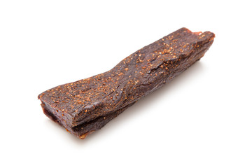 Beef Biltong, South African Beef Jerky isolated on a white studio background.