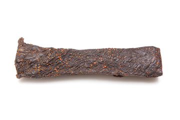 Beef Biltong, South African Beef Jerky isolated on a white studio background.