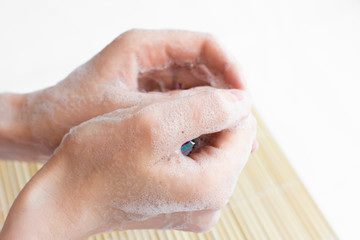 hand washing with soap. prevention. foam