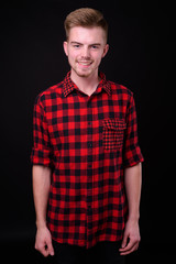 Fototapeta premium Portrait of young handsome blond bearded hipster man