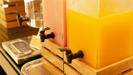 Guava and orange juice in the dispenser