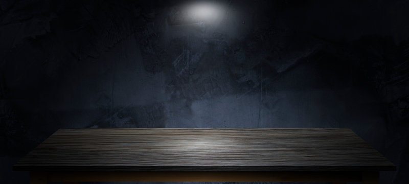 Texture empty brown wood table top texture in room black floor is made of dark plaster for interior decoration .used as background studio wall for display your products.