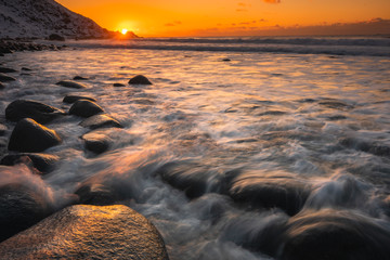 Sunset over the Uttakliev beach in Lofoten islands, winter time