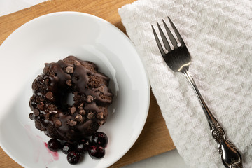 Small Chocolate Bunt cake with a fork.