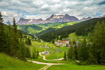 Chair lift in the Dolomites mountains in summer, Italy