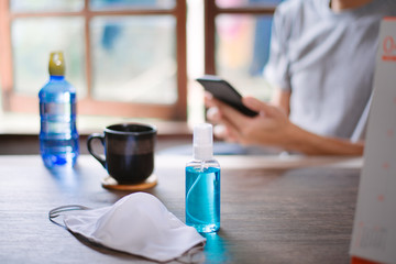 Self virus protection, Disinfectant on the desk, Close-up.