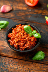 Sun dried tomato pesto with chilli, garlic and herbs in bowl