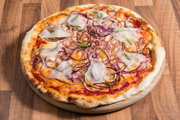 Pizza with cheese and red onion