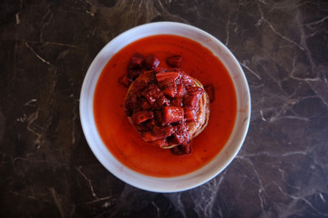 Stack of Vegan Pancakes with Homemade Strawberry Sauce. Delicious and healthy homemade breakfast.