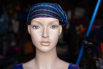 female mannequin is looking at you