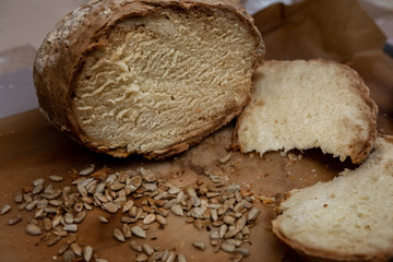 sliced slice of bread on a wooden board