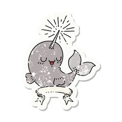 grunge sticker of tattoo style happy narwhal