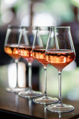 Glasses of rose wine on summer terrace