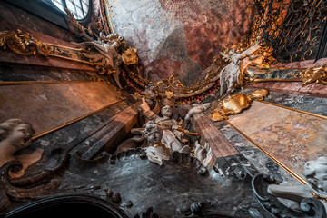 Upward view of St Peter  Petrus statue with two angels in entrance hall to Baroque church Asamkirche in Munich, Germany