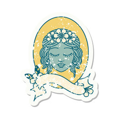 grunge sticker with banner of a maiden with eyes closed