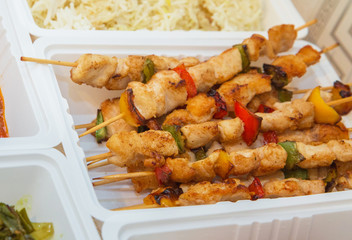 Delivery sets of healthy and delicious food in boxes . A variety of fast food in plastic boxes .