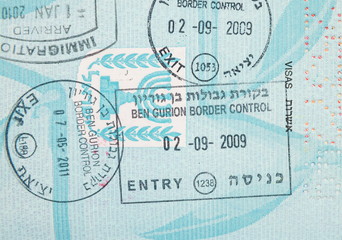 Fototapeta na wymiar Border crossing stamps in the passport
