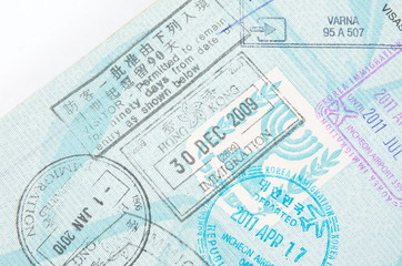 Fototapeta na wymiar Border crossing stamps in the passport
