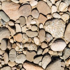 A pebble-stone pattern creating a natural texture on the ground. - 340290035