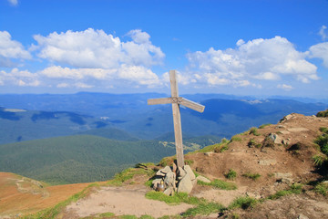 Christian cross on top of the mountain.