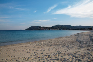 Fototapeta na wymiar Desert beach due to Coronavirus quarantine. Marina di Campo, Elba island, Italy