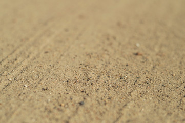 Sandy road with blur in the sunlight
