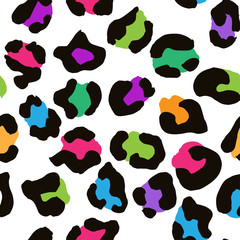 Fototapeta premium Leopard seamless pattern. Vector animal print. Multi colored spots on a white background. Jaguar, leopard, cheetah, panther fur. Leopard skin imitation can be painted on clothes or fabric.