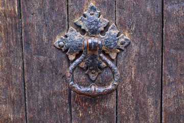 Old wooden door knocker.