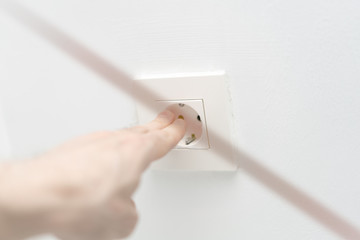 The fingers in the socket are crossed with a line. The concept of preventing accidents related to...