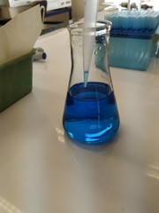 Laboratory Flask With Blue Liquid