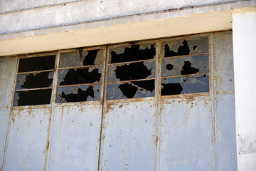 broken window in abandoned building