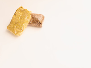 food donation. Buckwheat and millet on a white background