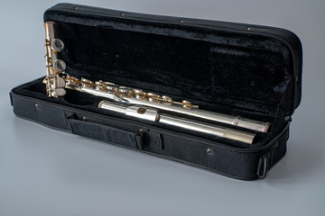 Unassembled Flute in black box container 