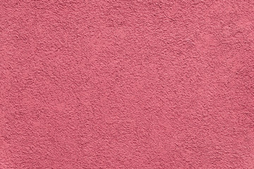 Fototapeta premium Texture of red painted and plastered building facade